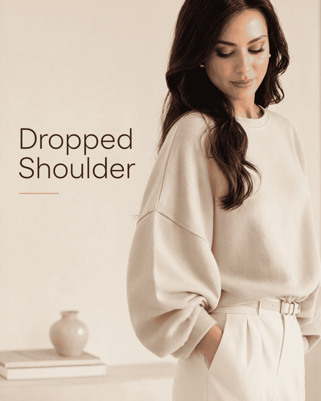 Editoriale Glossar-Grafik zu Dropped Shoulder mit ruhigen Farbfeldern und feiner Linienführung